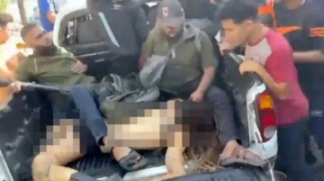 Hamas militanlarının kamyonda yarı çıplak taşıdığı kadın ölmedi mi? Annesinden açıklama var